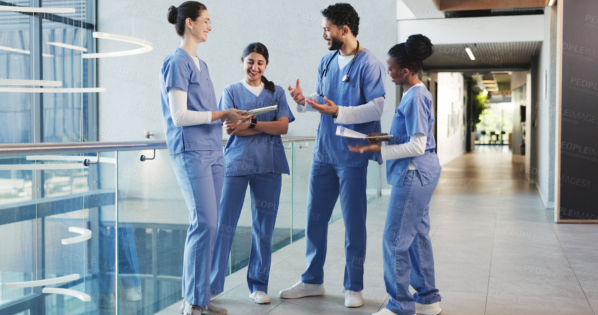 Buy stock photo Talking, hospital and med students in lobby for consulting, medical advice and diagnosis. Healthcare, internship and people in conversation, discussion and meeting for results and treatment plan