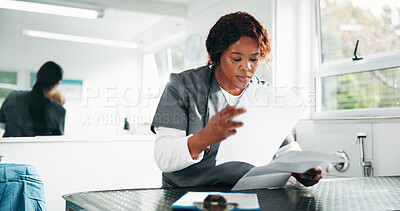 Buy stock photo Vet, reading and woman in clinic, documents and administration with checklist for appointment. Person, employee and professional with paperwork, report and review with process and healthcare services