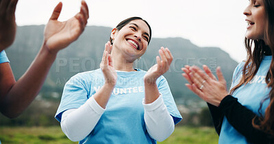 Buy stock photo Volunteer, people or applause in grass field for ngo event, conservation management or green advocate. Monitor nature, clap or happy group with teamwork for wildlife observation, eco support or goals