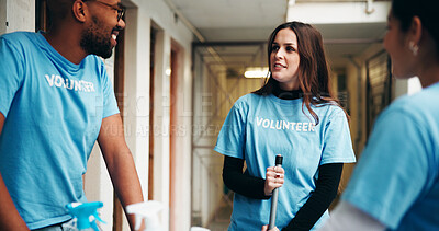 Buy stock photo People, volunteer and talk for cleaning charity, corridor maintenance and workplace hygiene. Women, man and equipment for hallway cleanliness, ngo briefing or sanitation chat of social responsibility