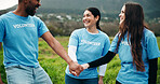 Volunteer, people and hands together in nature with smile for environmental outreach, charity or support. Happy, team huddle and collaboration for eco friendly project, social responsibility or help.