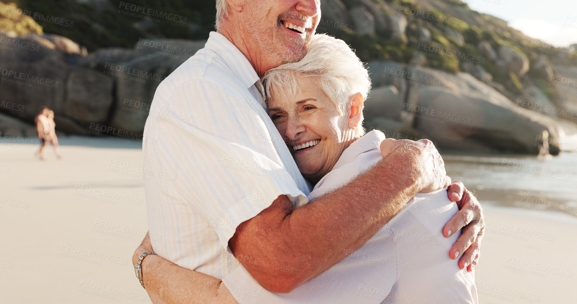 Buy stock photo Senior, happy couple and beach with hug for relationship, retirement holiday or love in nature. Elderly, man and woman with smile or embrace on ocean coast for summer weekend, outdoor getaway or date