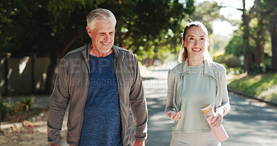 Buy stock photo Fitness, woman and walking with old man, park and laughing with daughter, health and workout routine. Outdoor, people and bonding with senior parent, happy and exercise for wellness, smile and family