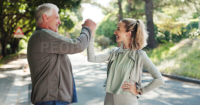 Buy stock photo Senior man, personal trainer and fitness with success in road for achievement, workout or exercise. Elderly, male person or coach with smile, handshake or high five for winning or physical activity