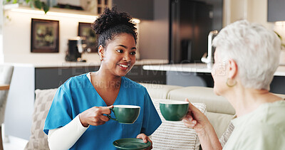 Buy stock photo Coffee, healthcare or visit with nurse and old woman on sofa in living room of home together. Caffeine, conversation or relax with medical caregiver and senior patient drinking beverage in apartment