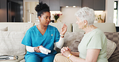 Buy stock photo Caregiver, explain and medicine with senior woman for prescription, instructions and dosage. Nurse, talk or elderly person with pills box for medical treatment, healthcare guidance and health in home