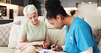 Checklist, old woman and nurse in home for writing medical assessment, checkup or consultation. Clipboard, caregiver and senior person in retirement for health evaluation, report and test results