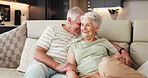 Love, smile and funny with old couple on sofa for bonding retirement and connection. Support, happiness and marriage partner with elderly man and woman in living room of home for commitment and laugh