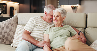 Buy stock photo Love, smile and funny with old couple on sofa for bonding retirement and connection. Support, happiness and marriage partner with elderly man and woman in living room of home for commitment and laugh