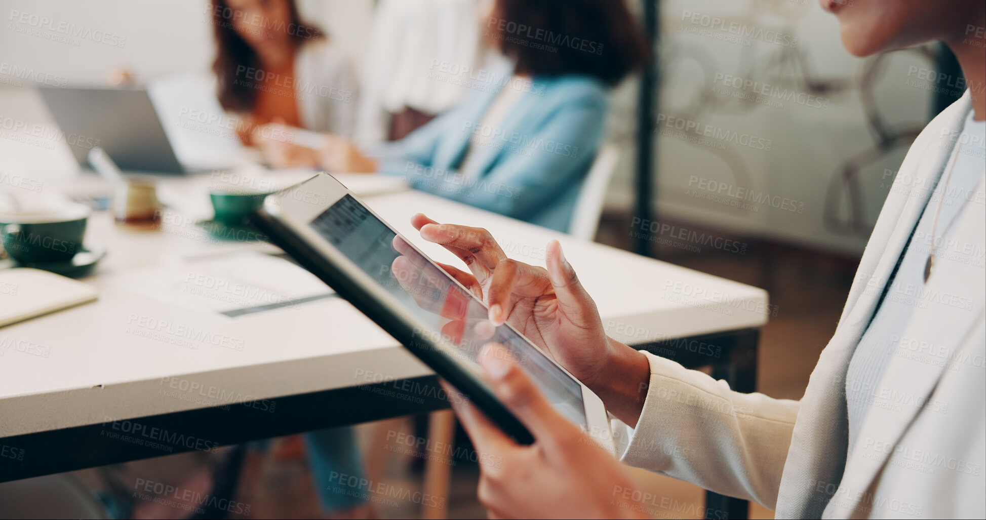 Buy stock photo Hands, typing and creative with tablet screen, coworking and reporter with article on web and online. Newsroom, journalist and person with tech for story, scroll and editing for magazine publication