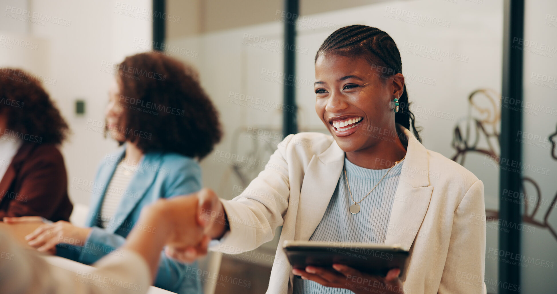 Buy stock photo Woman, tablet and handshake at startup in office meeting with deal, smile or agreement at media company. Person, tech and shaking hands for proposal, app or happy for collaboration at creative agency