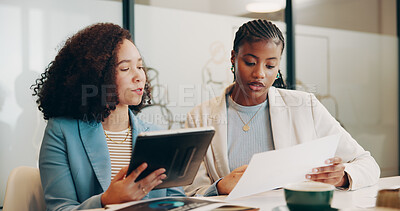 Buy stock photo Conversation, documents and tablet with business women in office together for feedback or review. App, meeting and paperwork with employee people in workplace for discussion, planning or research