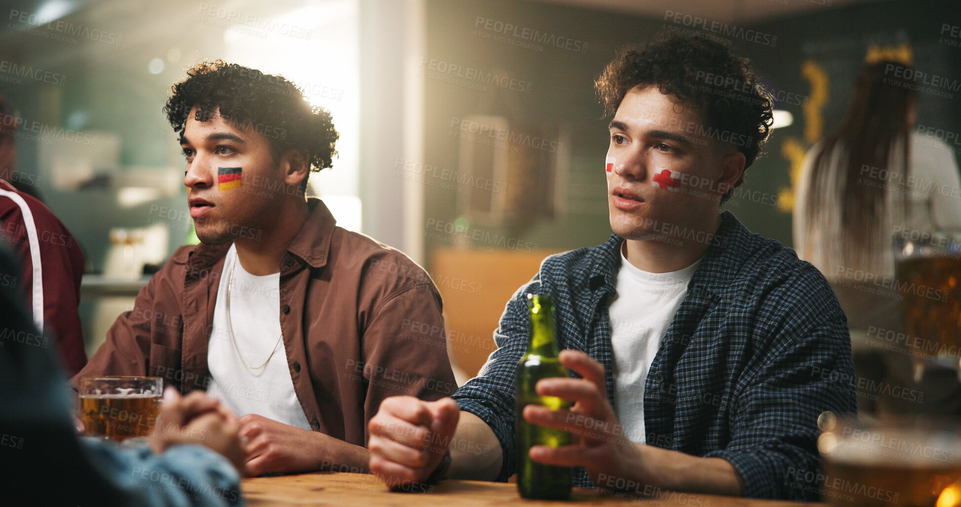 Buy stock photo Pub, watch or men with anxiety for game, world cup tournament or soccer fans with online broadcast. Worry, live stream or people with flags for team support in sports bar, England or Germany match