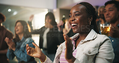 Buy stock photo Watching tv, woman and clapping with fans at pub for match goal, celebration and entertainment. Sports event, excited people and applause in bar for soccer tournament, live broadcast and team victory
