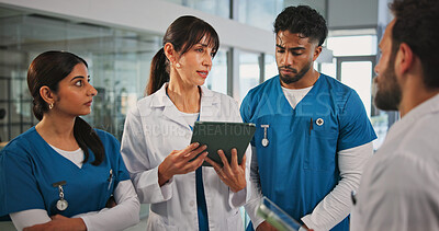 Buy stock photo Tablet, discussion and doctors with nurses in hospital for medical report, research or feedback. Digital technology, collaboration and team of healthcare employees with talking for advice in clinic.