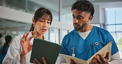 Buy stock photo Tablet, plan and nurse with doctor in hospital lobby for advice with surgery, medicine or treatment report. Teamwork, woman and man with information, document and support for healthcare professional