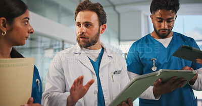 Buy stock photo Tablet, folder and doctors with nurses in hospital for medical report, research or feedback. Digital technology, documents and team of healthcare employees in discussion for advice in clinic.