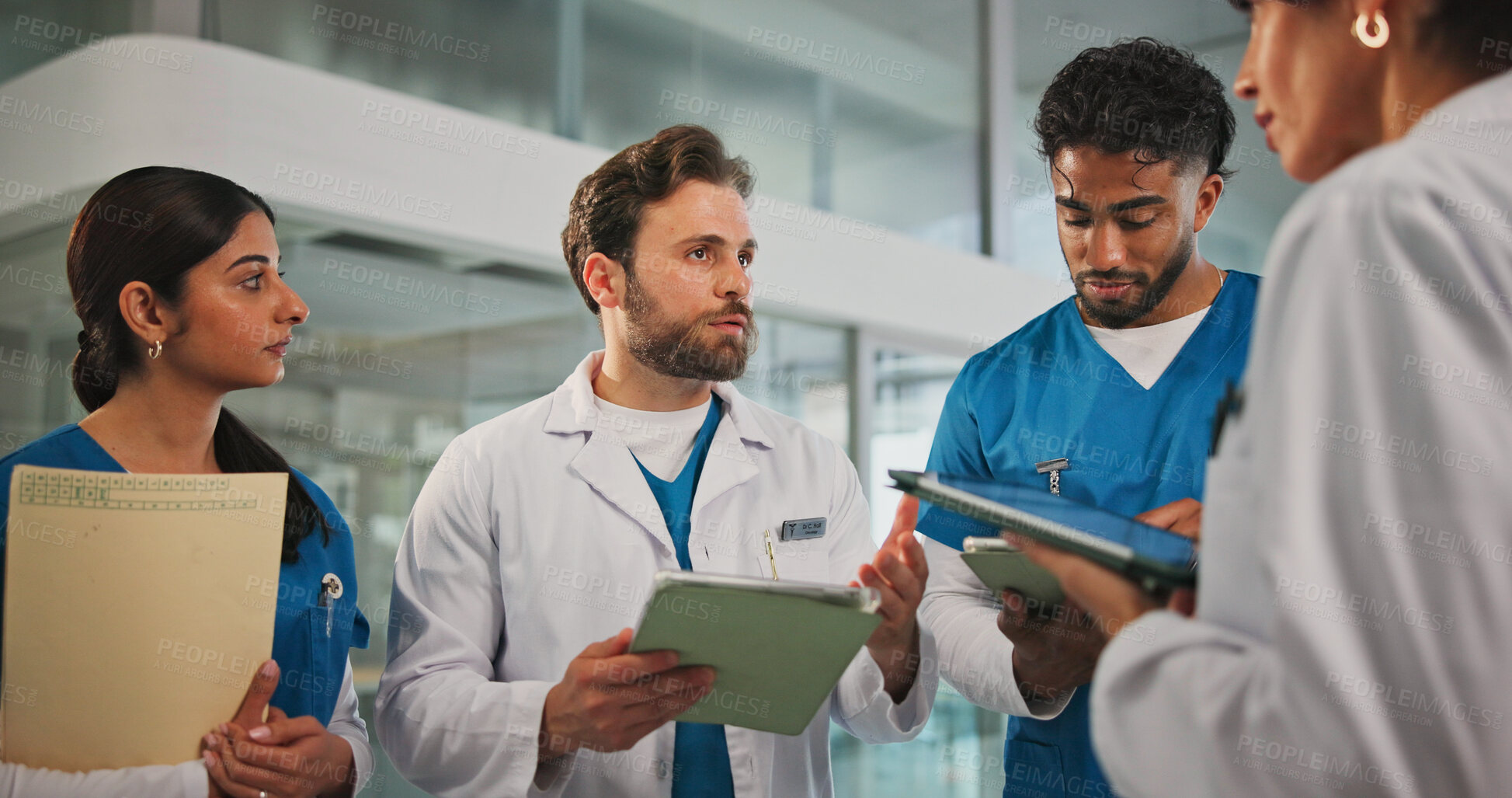 Buy stock photo Tablet, teamwork and doctors with nurses in hospital for medical report, research or feedback. Digital technology, folders and healthcare employees with documents in discussion for advice in clinic.