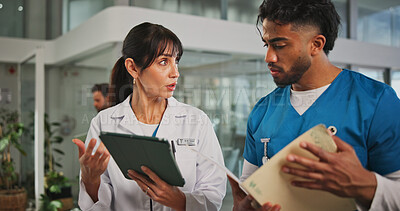 Buy stock photo Tablet, planning and nurse with doctor in hospital lobby for advice with surgery, medicine or treatment. Teamwork, woman and man with information, document and support for healthcare professional