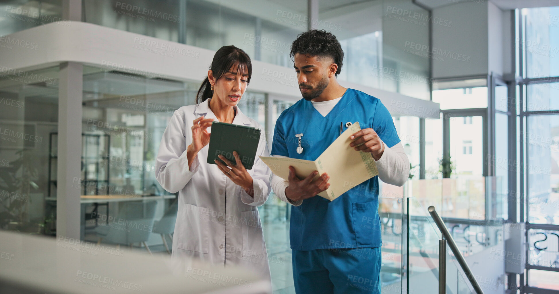 Buy stock photo Tablet, information and nurse with doctor in hospital lobby for advice with surgery, medicine or treatment plan. Teamwork, woman and man with report, document and support for healthcare professional
