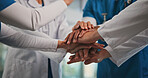 Closeup, nurses and doctors with handstack in hospital for celebration, surgery success and victory. People, healthcare workers and huddle for medical milestone, staff motivation and team achievement
