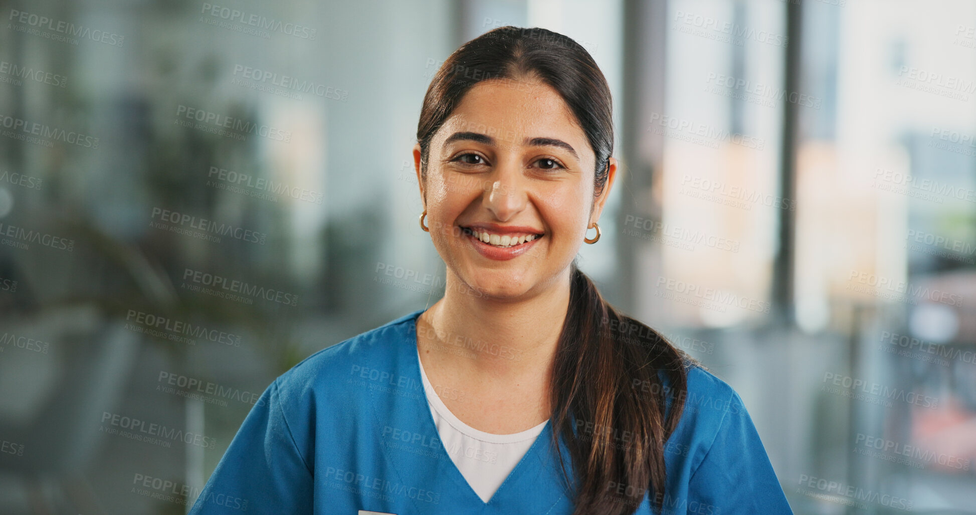 Buy stock photo Portrait, woman and nurse with smile in hospital for career pride, about us and medical service. Happy, female person and ambition for healthcare assistance, patient care and confidence for wellness