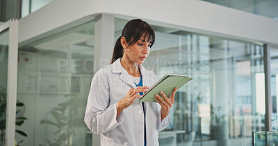 Buy stock photo Doctor, woman or reading with tablet in hospital, healthcare platform or access medical records for info. Patient vital update, review medicine schedule or person with online report, tech or research