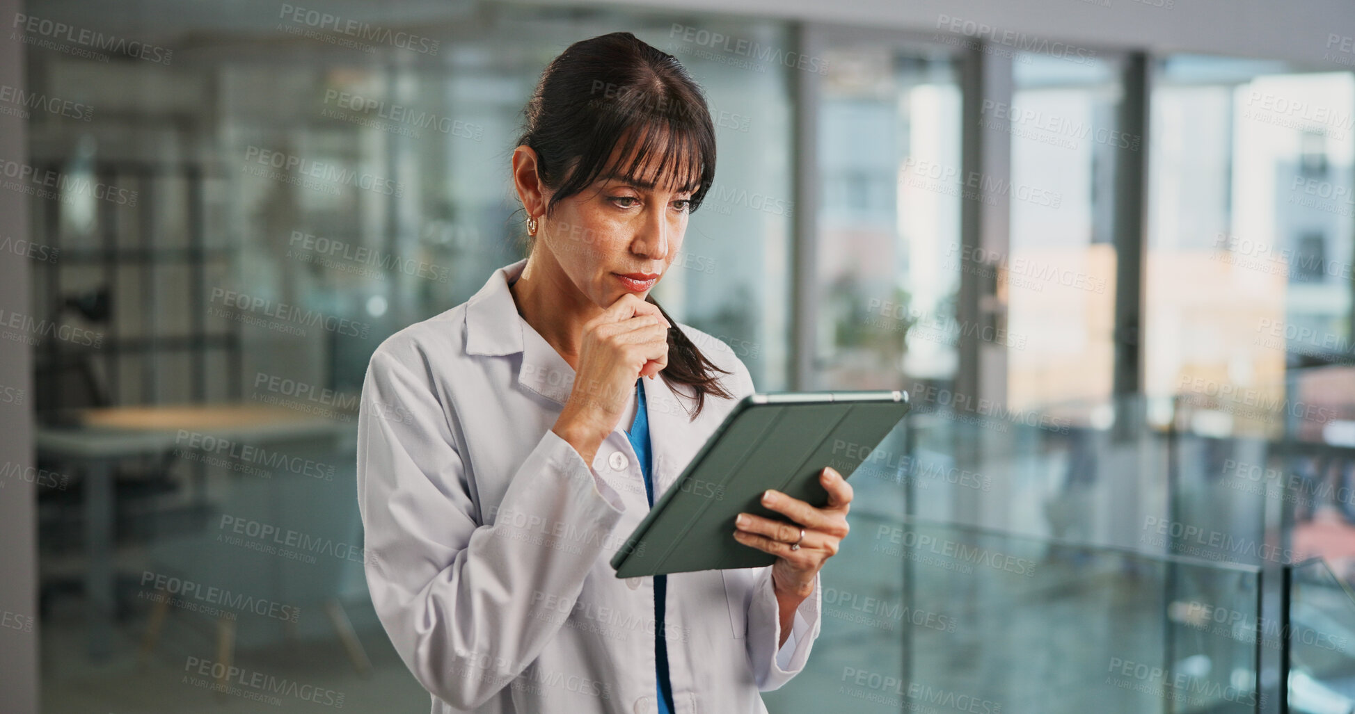 Buy stock photo Thinking, doctor and woman in workplace, tablet and internet with digital app for test results. Mature person, medical service or professional in clinic, tech or decision with schedule and healthcare