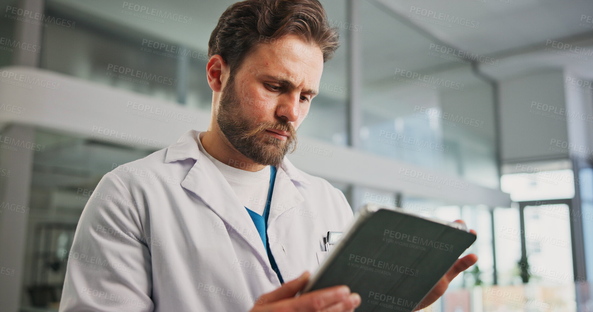 Buy stock photo Medical, scroll or man in hospital with tablet, research or patient diagnosis in online consulting. Health, records or doctor in clinic with tech, telehealth or symptoms evaluation for treatment plan