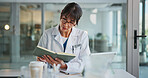 Doctor, reading and woman with notebook, office and medical diagnosis for treatment plan or research. Hospital, healthcare worker and mature person with journal, serious and notes for patient history