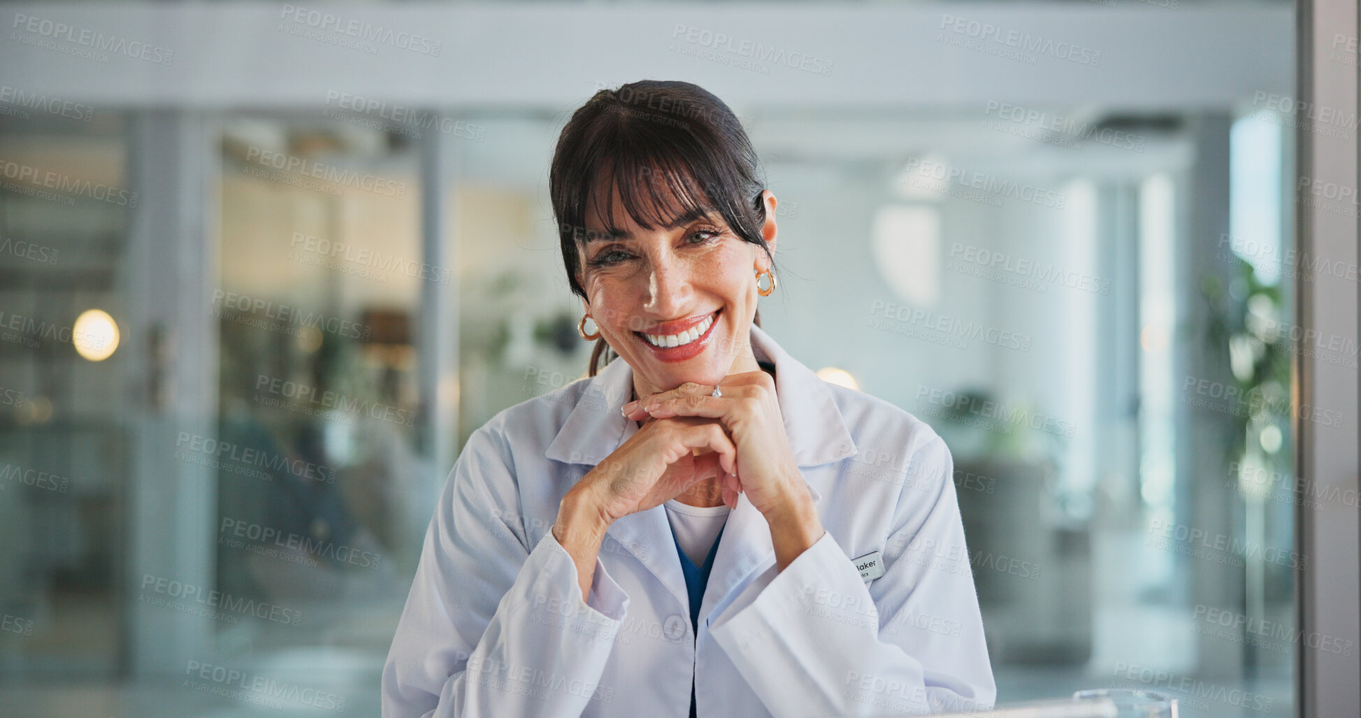 Buy stock photo Portrait, doctor and happy woman in hospital, healthcare and career ambition with pride. Professional, mature person and employee in clinic, confidence and medical service with success and trust