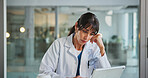 Doctor, fatigue and woman with laptop, hospital or reading medical diagnosis on website or exhausted. Clinic, healthcare worker and mature person with tech for test results, pressure and overworked