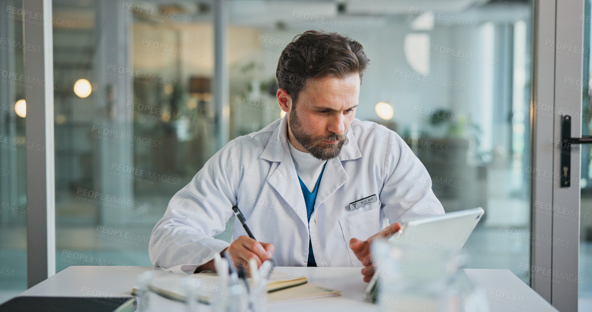 Buy stock photo Man, doctor and tablet in office with notes for healthcare, prescription or writing. Patient report, administration and tech with medical professional for documents, schedule or planning in clinic