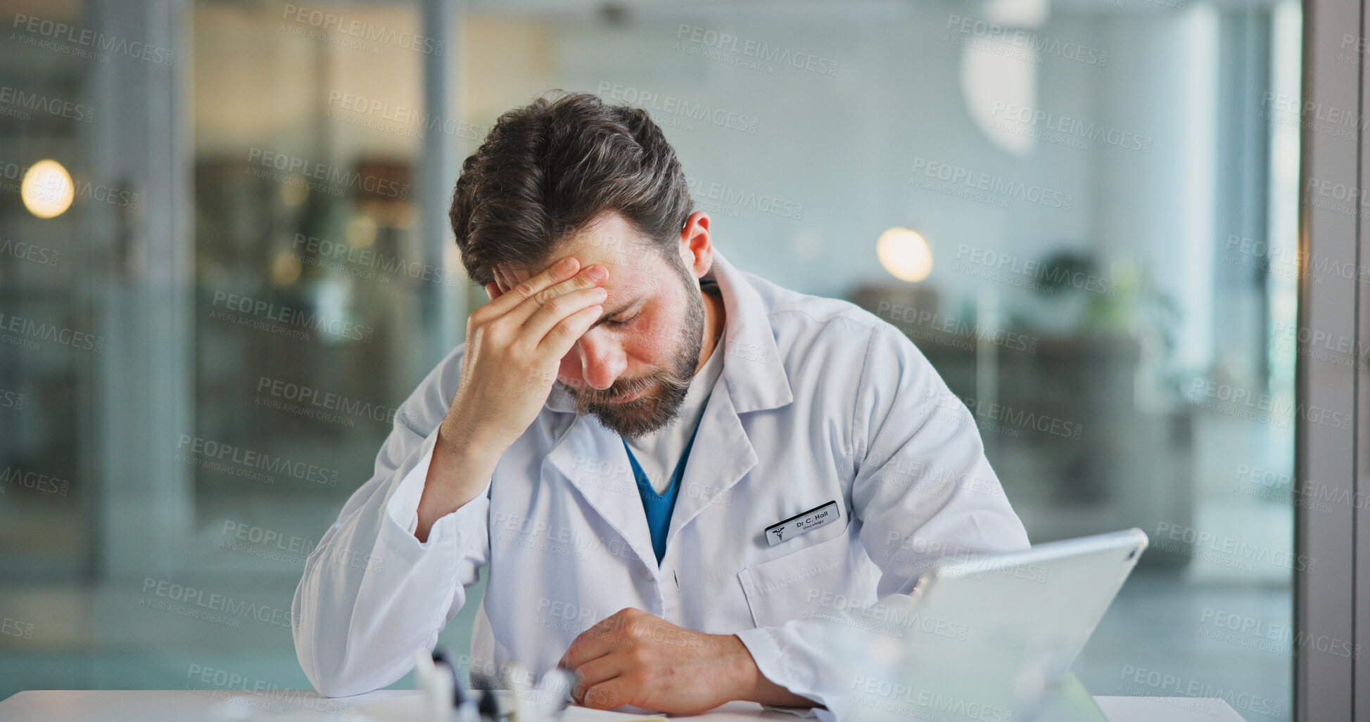 Buy stock photo Headache, doctor and man in clinic, pain and stress with pressure, brain fog and tired. Person, medical service and employee in hospital, migraine and burnout with anxiety, frustrated and fatigue