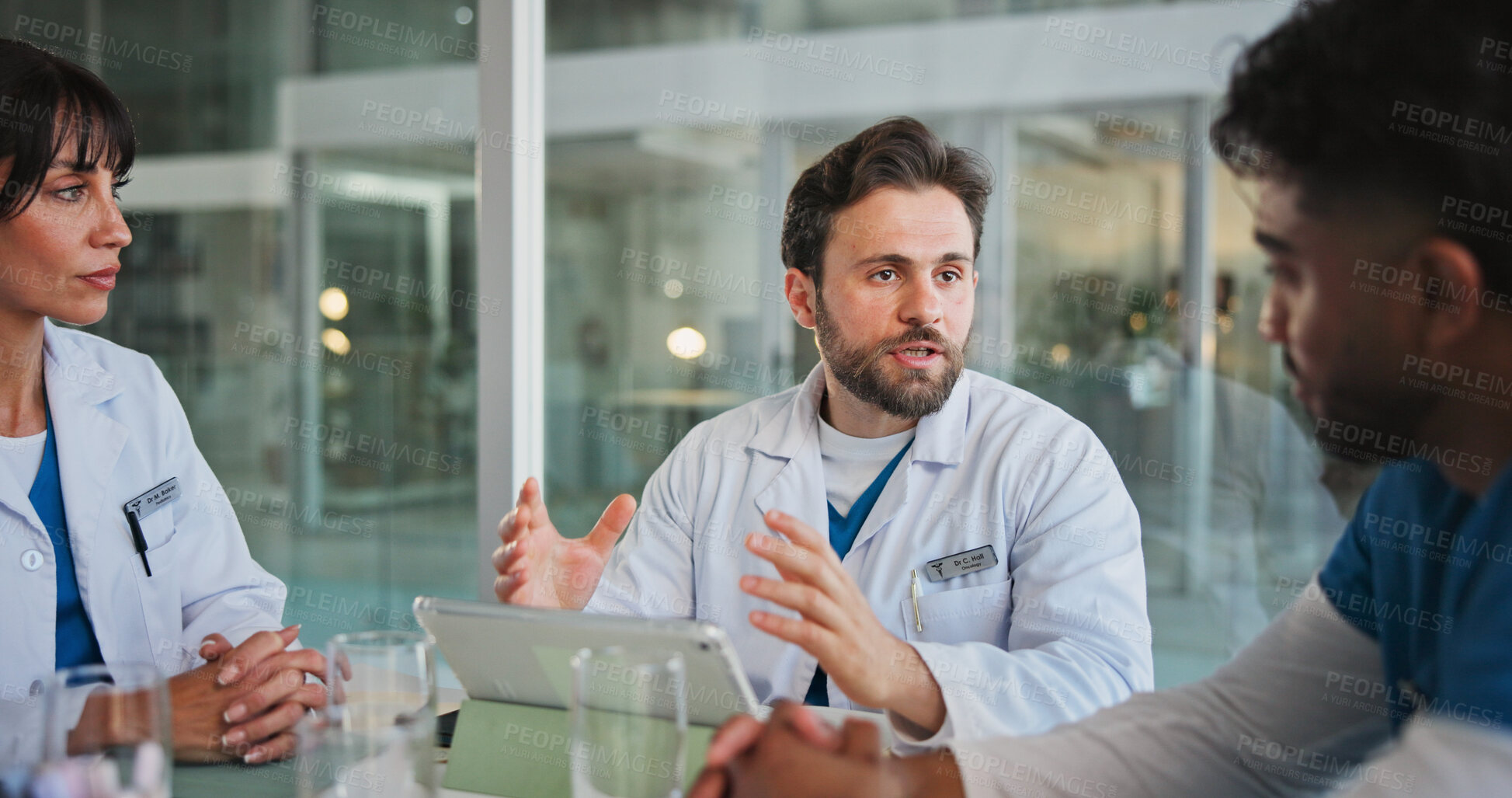 Buy stock photo Nurse, doctors and tablet with discussion in hospital for case review, medical results and planning. Healthcare team, people and feedback with tech in clinic for workflow update or treatment options