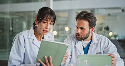 Buy stock photo Tablet, partner and reading with doctors in office for medical case review, treatment plan or research. Patient history, online healthcare result and team with people talking for clinic report