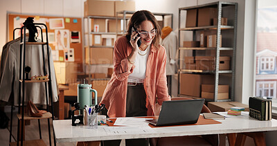 Buy stock photo Woman, designer and phone call with laptop, dropshipping and smile for order on web at startup. Person, smartphone and pc for talk, happy and creative project for clothes delivery schedule at studio