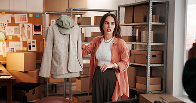 Buy stock photo Fashion, influencer and promotion with woman in warehouse for startup, ecommerce show and merchandiser. Content creation, online shopping broadcast and live streaming with person and clothes