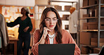 Woman, laptop and review for dropshipping, fashion and notification with ecommerce order at startup. Person, entrepreneur and designer with computer, feedback and glasses with creativity at workshop