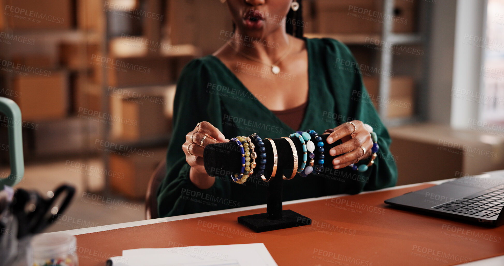 Buy stock photo Content creator, vlog and hands with bracelets, small business and product promotion on social media. Influencer marketing, live streaming and person with jewelry, talking and ecommerce in warehouse