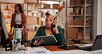 Woman, phone call and tablet for fashion startup with discussion, contact supplier and ecommerce. Female person, mobile and digital for logistics, confirm order and shipping for clothes distribution