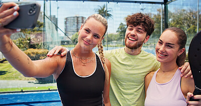 Buy stock photo Woman, friends and selfie with smile at tennis court, hug and excited for padel game, post or memory. Group, man and girl with embrace, photography or happy with fitness on social media at sport club