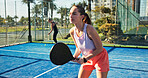 Sports, padel and woman and man on court for exercise, training and practice for competition. Tennis, athlete team and people with racket for playing game, match and tournament for challenge outdoor