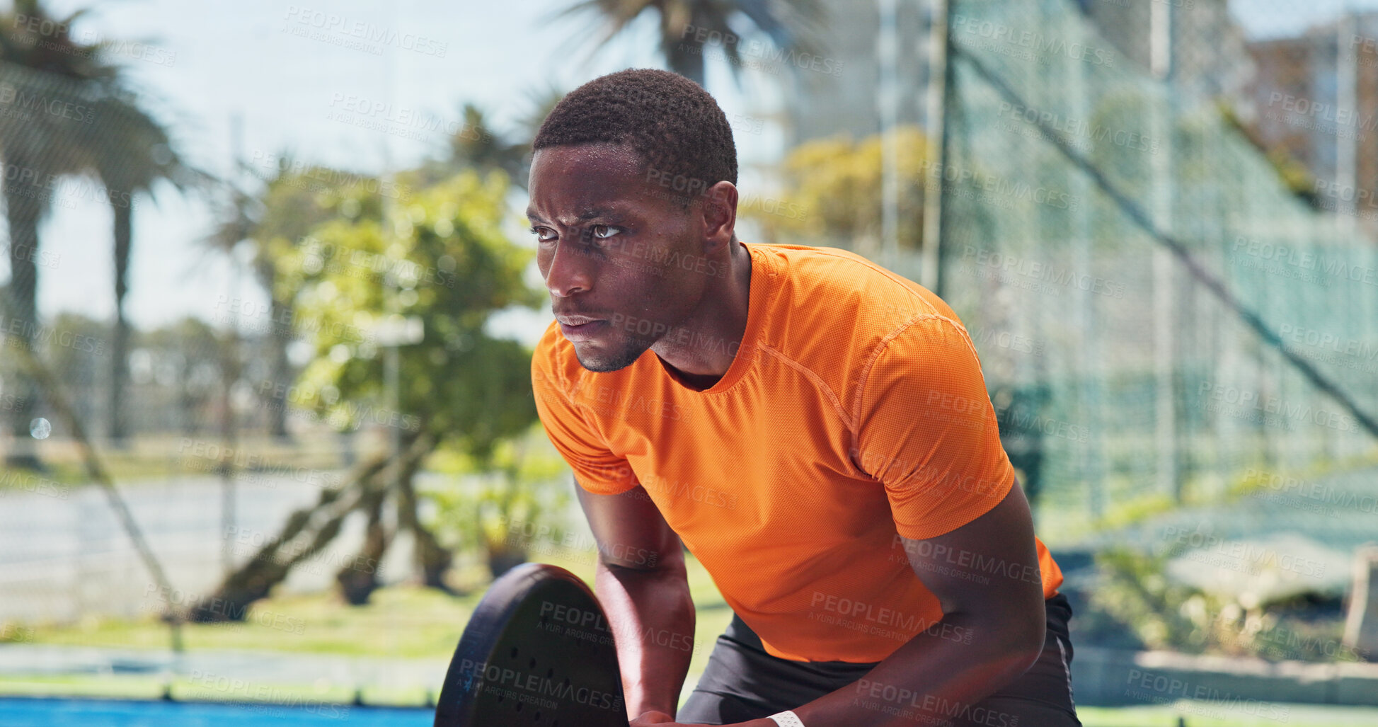 Buy stock photo Sports, padel and black man on court ready for exercise, training and practice for competition. Tennis, athlete and person with racket for playing game, match and tournament for challenge outdoor