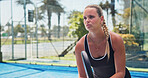 Sports, padel and woman on court outdoor for exercise, training and practice for competition. Tennis, athlete and person with racket ready for playing game, match and tournament for challenge outdoor