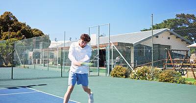 Buy stock photo Fitness, action and man on tennis court with racket, swing practice and energy in training match. Padel, competition and athlete on turf with equipment, intense game and ball control in sports hobby.