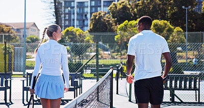 Buy stock photo Fitness, friends and chat outdoor with tennis racket for wellness, match or competition practice. Active, people or athletes on court with equipment for game plan, sports discussion or start workout.