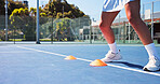 Tennis court, fitness and legs with cone for training, agile practice and sports drill for workout. Coordination exercise, speed development and woman with footwork performance, outdoor and equipment