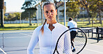 Portrait, fitness and woman outdoor with tennis racket for wellness, training and competition practice. Active, person and serious on court with equipment for exercise, sports game and start workout.