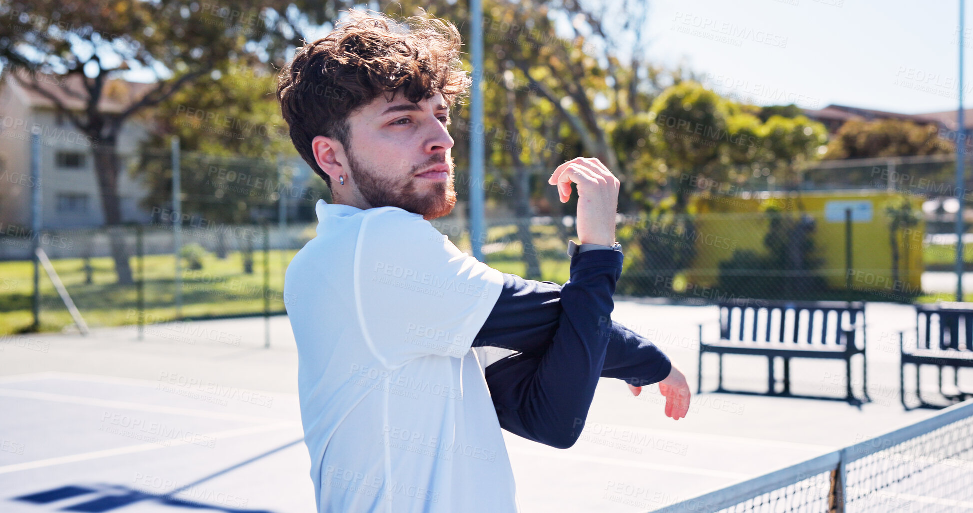 Buy stock photo Tennis court, stretching arms and man outdoor for fitness, training and practice for game. Sports, athlete and person with warm up for workout, hobby and exercise for match, tournament and challenge